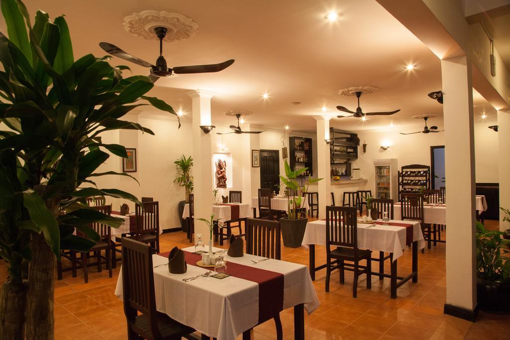 洱湾精品酒店wind Boutique Hotel シェムリアップ レストラン 写真